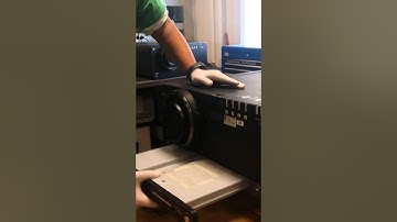 Replacing and cleaning air filter at Panasonic PD-T12000 Projector .