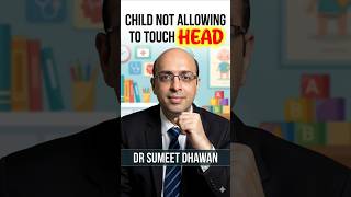 child not allowing to touch head