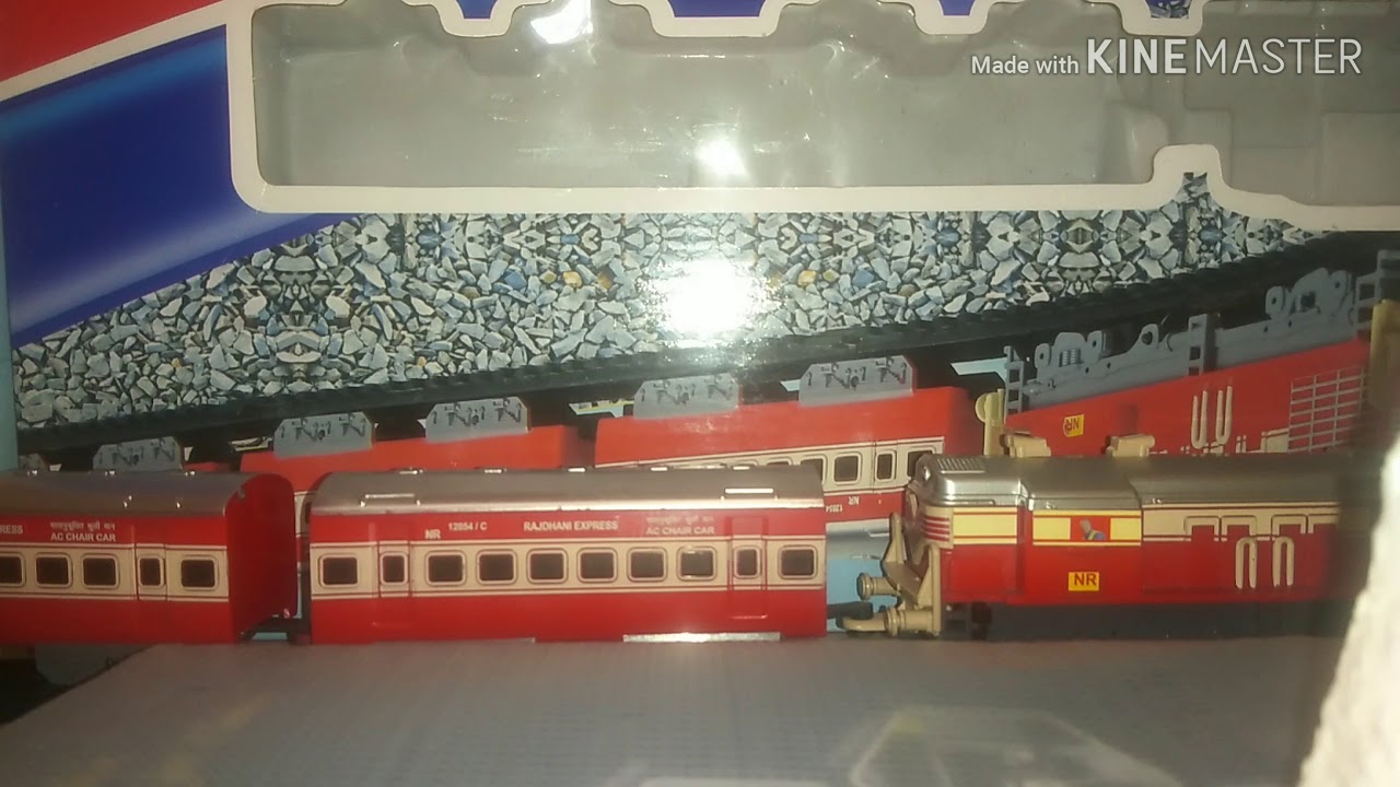 Indian model train toy passing the station for kids YouTube