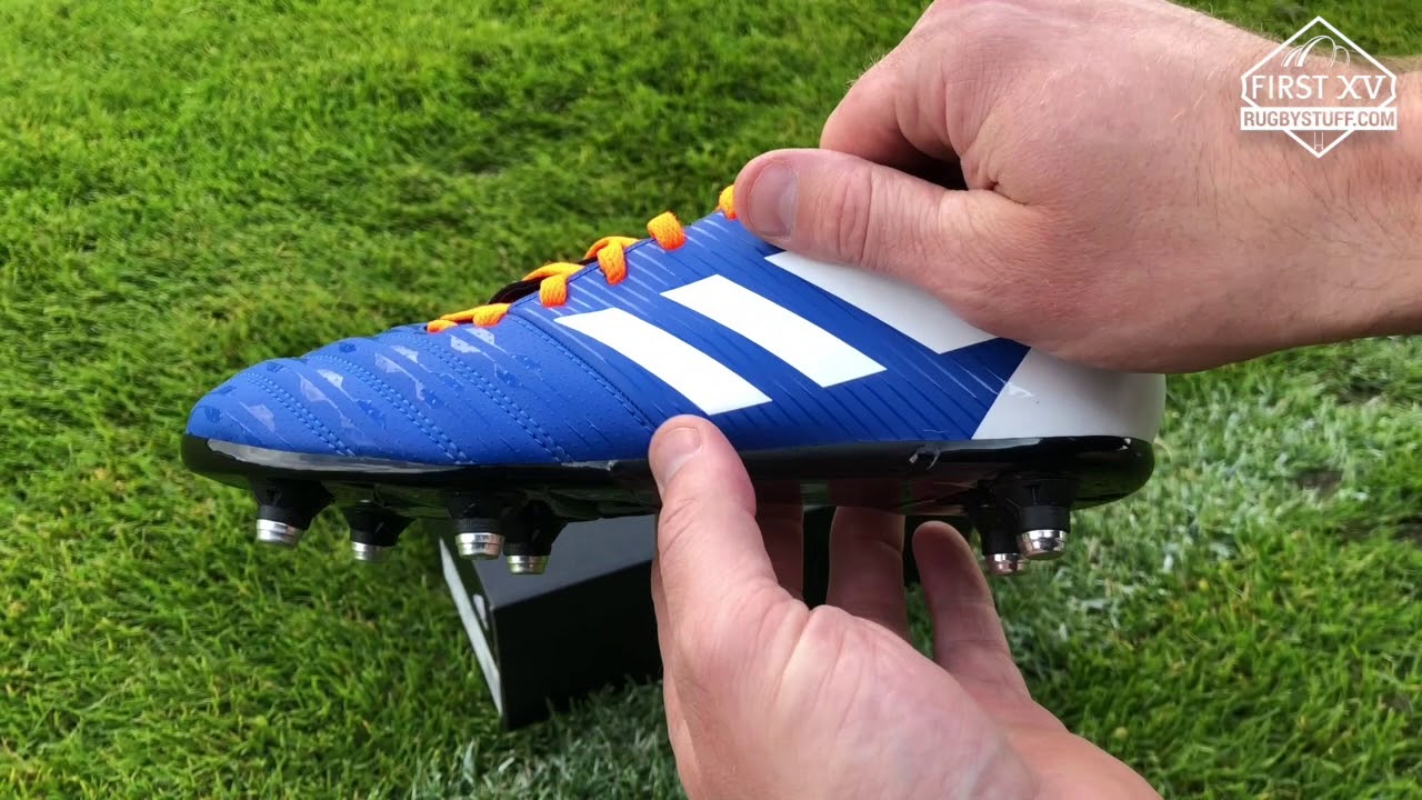 Adidas Kid's Malice Soft Ground Rugby Boots in Blue/Core Black/Solar Orange colourway.