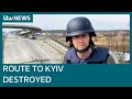 Hundreds of shells fall on Kyiv suburb as Ukrainians blow up bridge to halt Russian tanks | ITV News