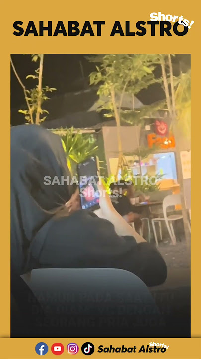 A woman is suspected of cheating, while eating with a man but secretly having a video call with a...