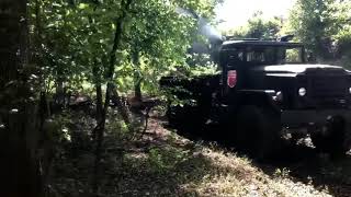 M923A2 5 ton 6x6 8.3 liter Cummins Straight Pipe pulling a dead oak tree