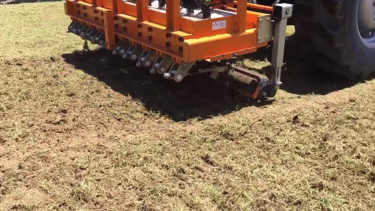 Punching Sprigs In The Ground 3 Turf Equipment Source YouTube