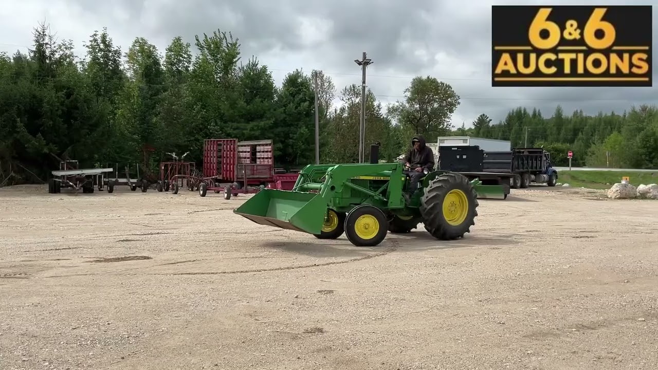 John Deere 1630 Tractor With Loader And Back Blade