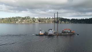 Following construction boat on Mercer Island