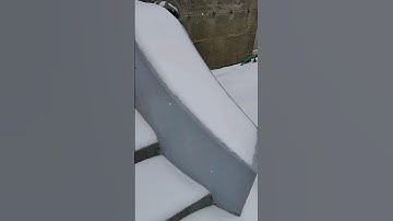 Removing Snow From Old Ciment Staircase Rail