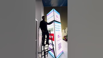 Rotating Backlit Trade Show Display Tower with Modern Design#exhibitiondesign#SEMAshow#IAAPAexpo