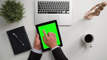 Man Using iPad With Green Screen Stock Video