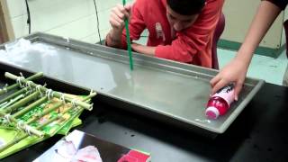 Wave attenuation testing with 1 8 scale PVC model