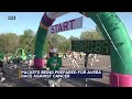 Volunteers piece together packets for Avera Race Against Cancer
