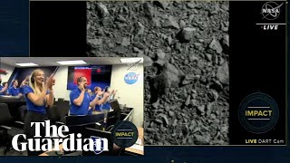 Joy and jubilation as Nasa crashes spacecraft into an asteroid in 'planetary defence test'
