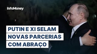 PUTIN e XI selam nova era de parceria estratégica com abraço em Pequim