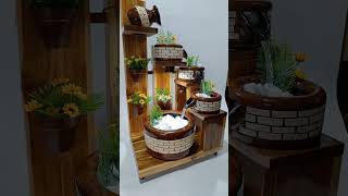 Fontes e Cascatas de Água 1 Pote com 4 quedas , com 3 vasos de flor, 1 luz dicroica , com rodinhas.