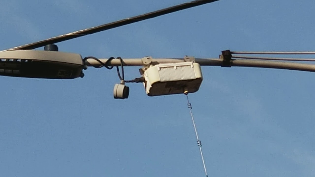 Strange device with antenna on street light YouTube