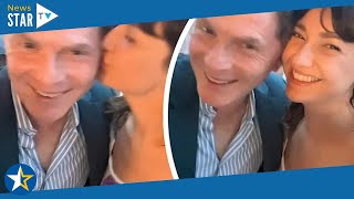 Bobby Flay's girlfriend Christina Perez plants kiss on TV chef's head in sweet 57th birthday tribute