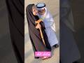 طفله بعباية تنكريه سيده عجوز في حفل يوم التأسيس واخوه بزي تنكري برجل عجوز يوم التاسيس