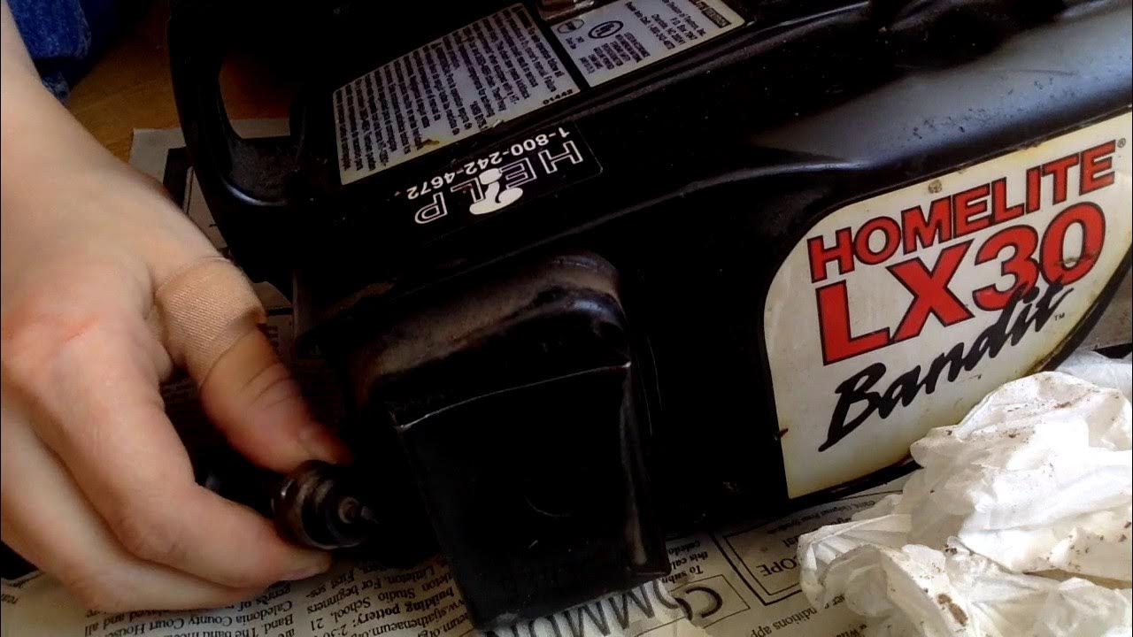 how test a engine for spark (homelite lx30 bandit chainsaw) YouTube