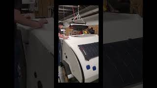 ✨Behind the Scenes✨A few helpful hands and a hoist make installing the Dometic RTX A/C unit easy!