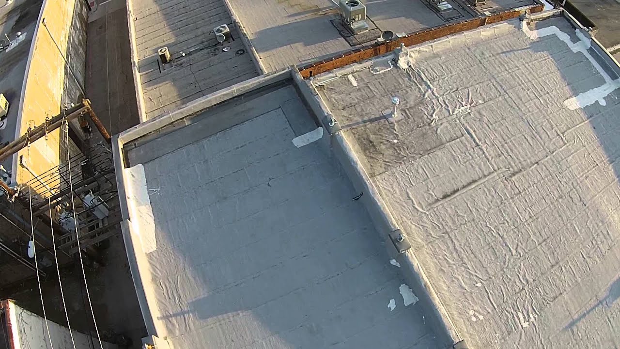 McKinney Texas flat roof coating project Before video by Firehouse Roofing