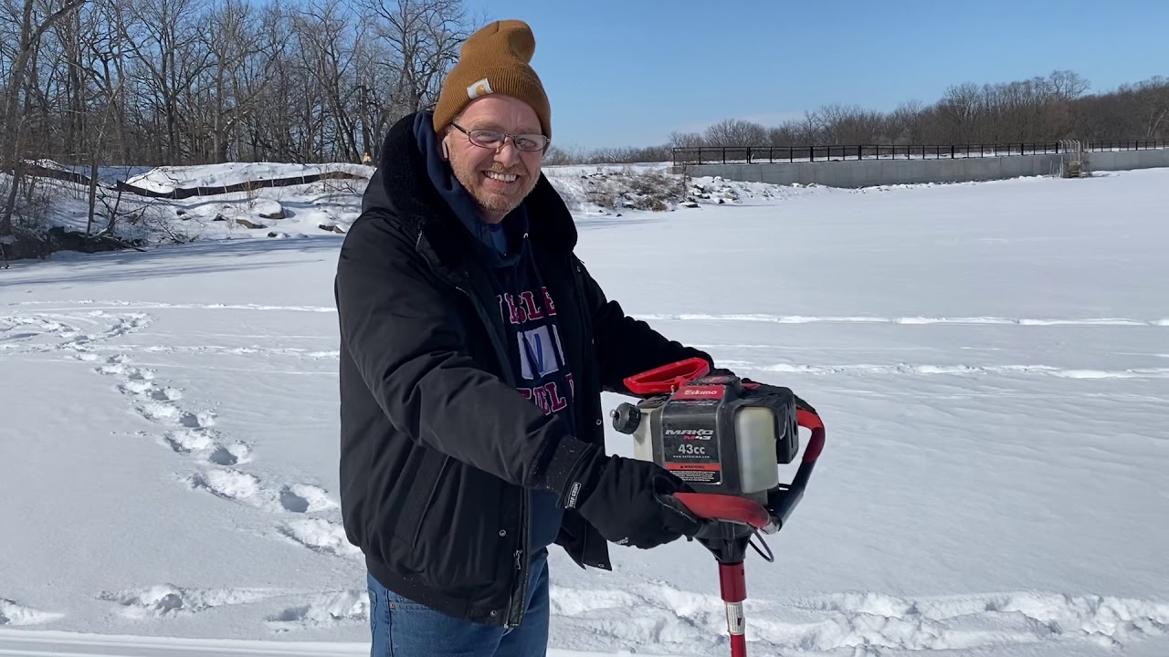 Drilling holes for Ice Fishing YouTube