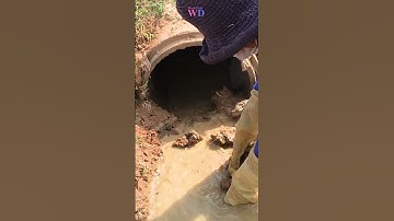 Unclogging Clogged Culvert Drain Removing Muddy
