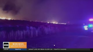 Brush fire near Verdi prompts evacuations, threatens buildings