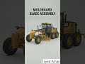 the inner workings of a Caterpillar motor grader powertrain.