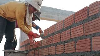 Making the wall by Red Bricks-by Skill Workers