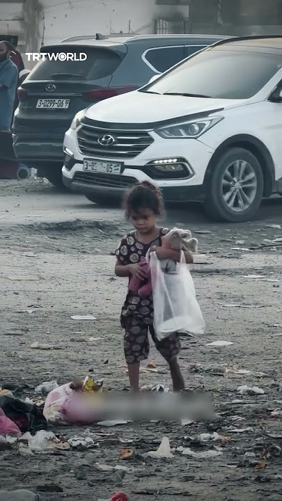 Palestinian child scavenges for food amid Gaza’s ongoing blockade