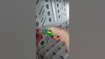 How to adjust the vending machine trays height?