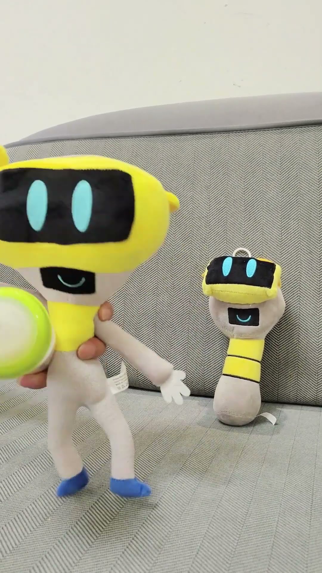 Fun Bot feeding cat with milk