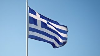 Greece Flag Waving In The Wind Against The Sky Stock Footage - Videohive