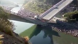 Miraculous escape after bridge collapses breaks in two