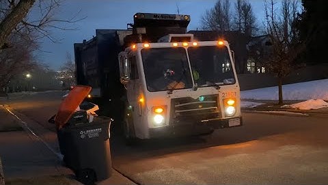 Mack LEU Autoreach Garbage Truck Working Into the Night