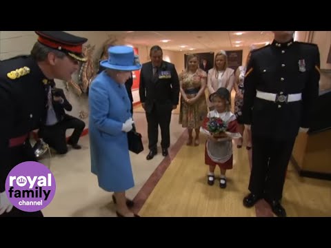 Little girl accidentally hit in the face by soldier after meeting the Queen