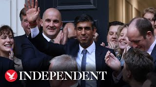 Rishi Sunak greeted with cheers from Conservative colleagues after winning race for PM