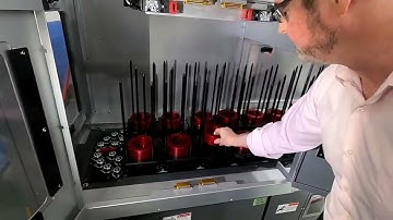 Takamaz XW 130 Twin Spindle Twin Turret CNC lathe with stocker, gantry loader/unloader