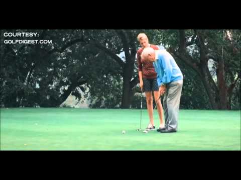 Kate Upton gives Arnold Palmer a golf lesson
