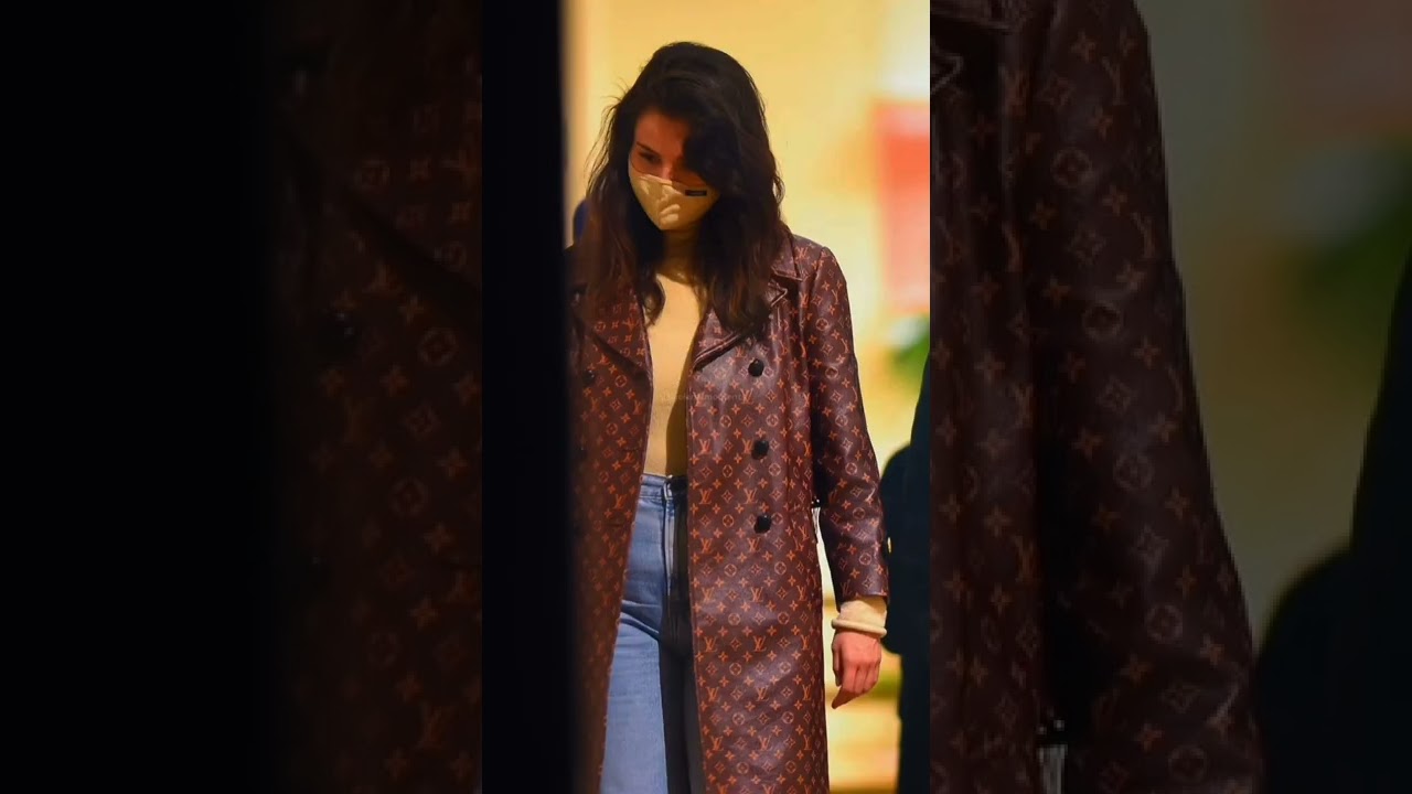 Selena Gomez Wearing Logo-Covered Louis Vuitton Coat in NYC