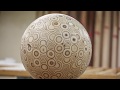 Guy makes a big ball out of plywood Guy makes a big ball out of plywood