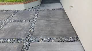 Veterans concrete,...custom concrete w/ large pebbles @ dividers, cure @ 40%
