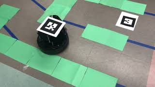 The black TurtleBot traverses the 5 x 6 maze with a fixed goal