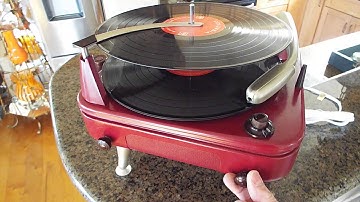 V-M automatic record player playing 33.3 RPM, 12" records.