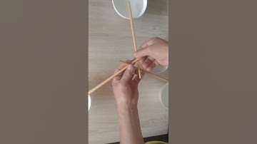 cách gác chén nước lên,3 chiếc đũa ,thế đòn bẩy cực kỳ hay.