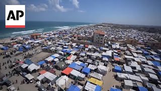 Tents crowd Mediterranean shore of Deir alBalah as more displaced Palestinians arrive