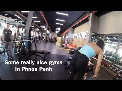 Walking around Phnom Penh, looking at gyms, motorcycles, and food.