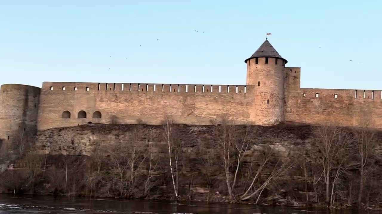 Narva, Estonia and Ivangorod, Russia. A walk along the Narva River across from Ivangorod Fortress.