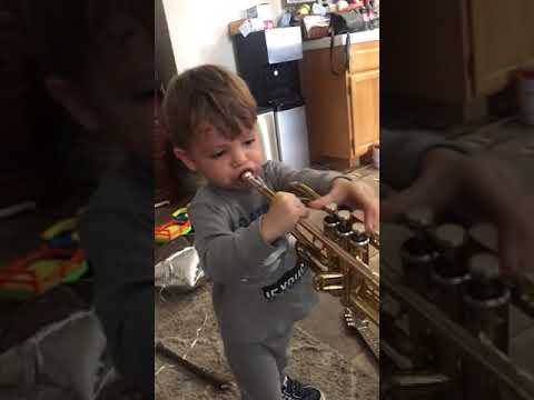 Two-year-old playing a