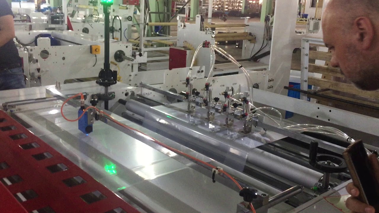 CW1000FB BOTTOM SEAL BAG MACHINE WITH FLY KNIFE CUTTING YouTube